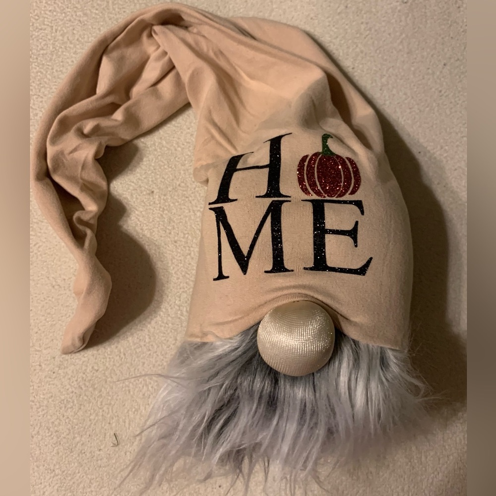 Fall gnome with pumpkin that says HOME